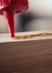 Applying wood adhesive along a timber edge